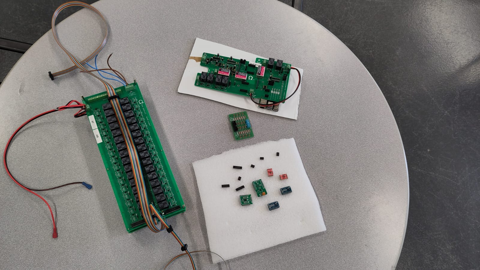 Workshop participants working with OhmPi components